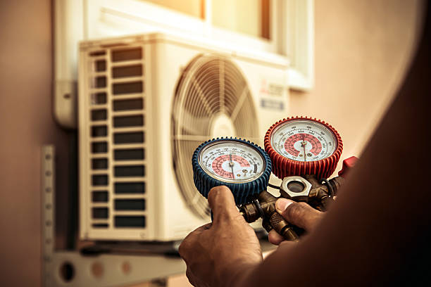 Professional Heat Pump Repair technician working in Whitewater, WI